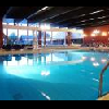 Wellness Hotel Bük - esti kép a külső medencéről